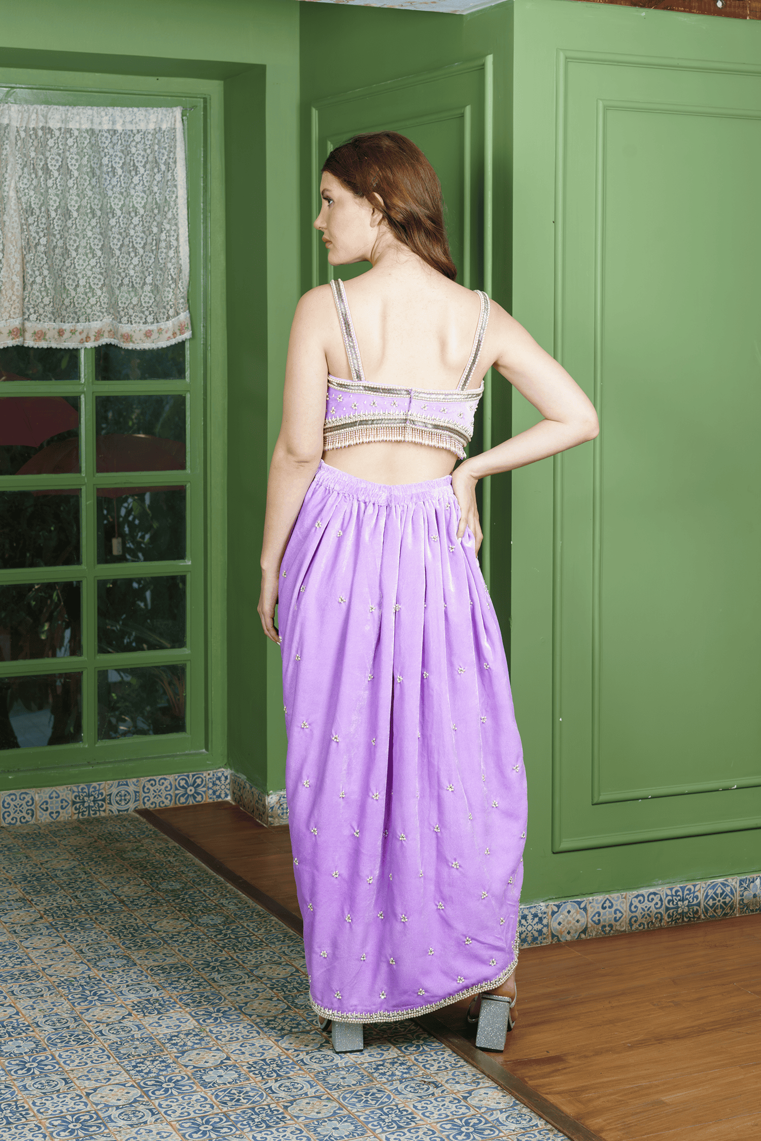 Back view of Indo Western dhoti skirt and crop top in lilac velvet with pearl straps.